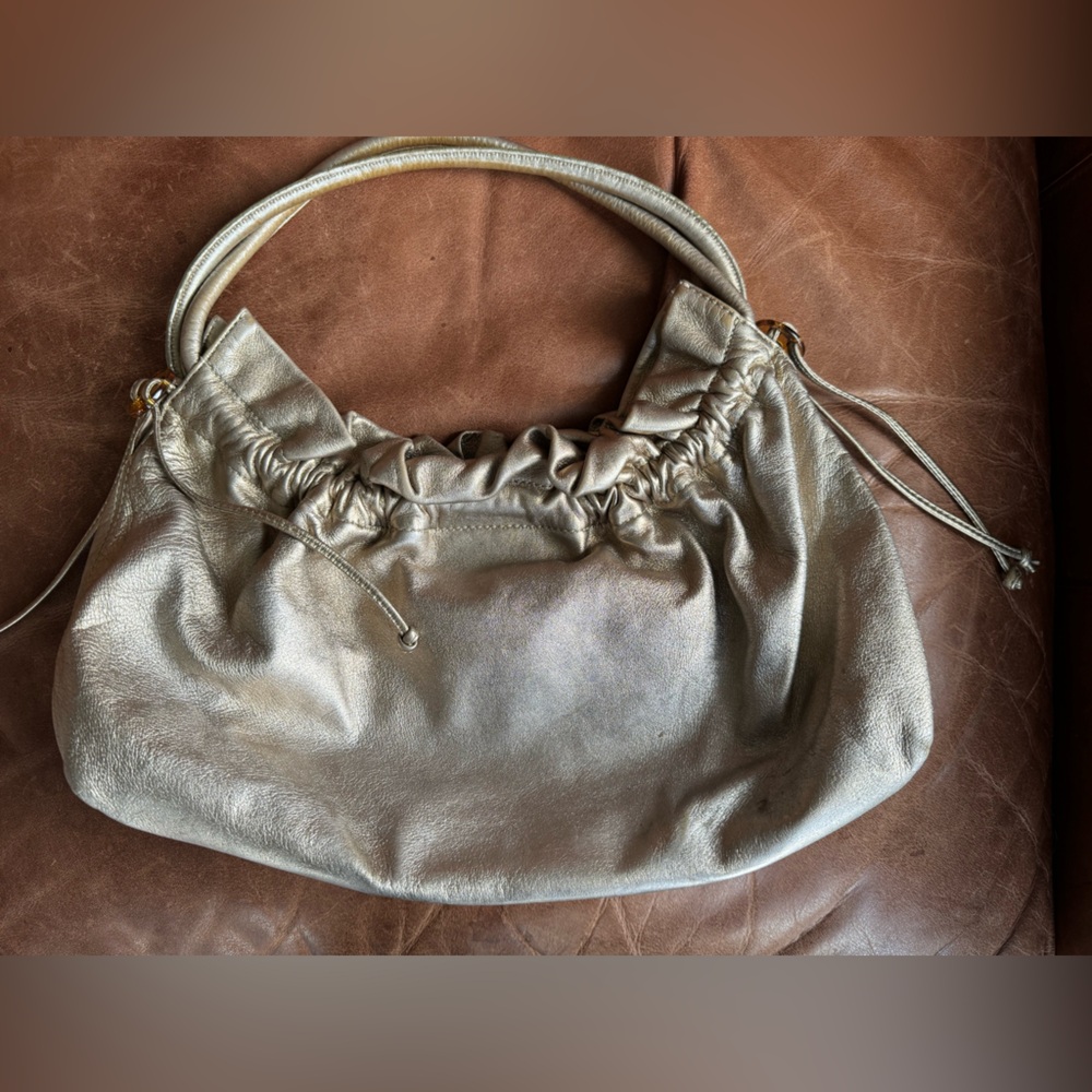 Antique gold/ bronze shoulder bag by Cole Haan from early 2000s